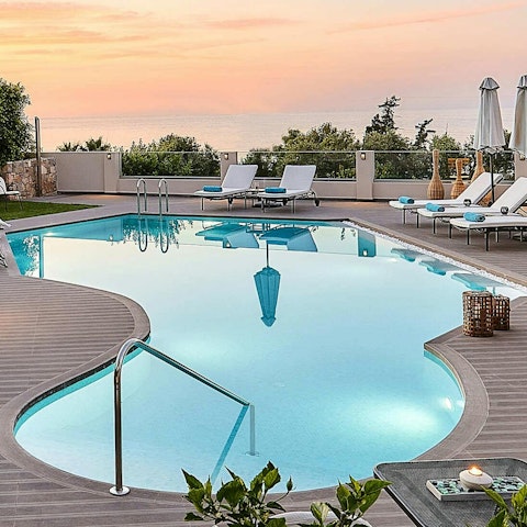 Swim in the private pool overlooking the Aegean Sea