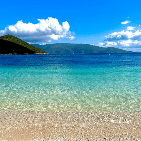 Spend a day at Skala Beach, reachable by car