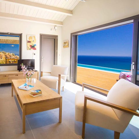 Enjoy the deep blue of the sea from the comfort of the living room