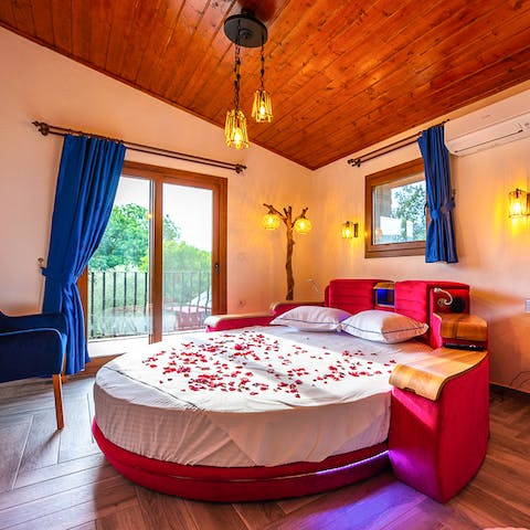 Snuggle up in the romantic main suite after a busy day exploring the countryside