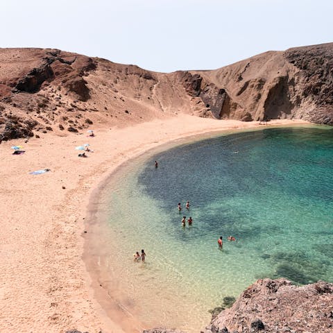 Swim and sunbathe on the spectacular beaches of Playa Blanca