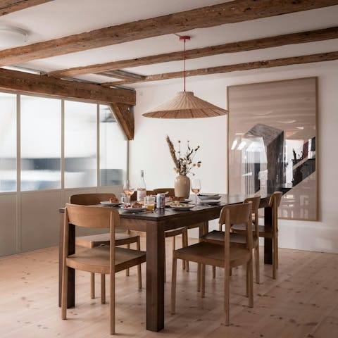 Nibble on Danish pastries around the dining table