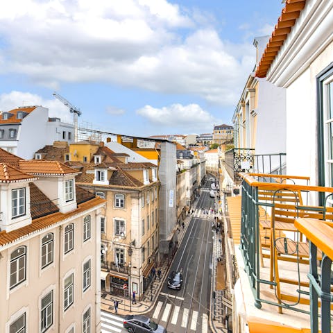 Head out onto the balcony on sunny mornings to watch the city wake up around you