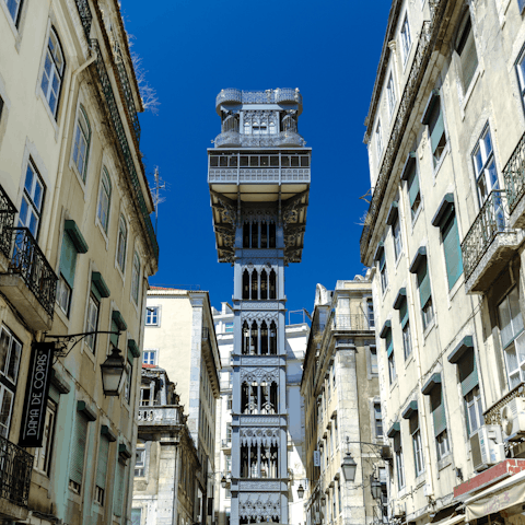 Go on a short walk over to the Santa Justa Elevator to take a ride to the skies