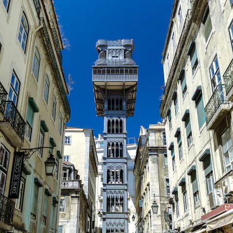 Go on a short walk over to the Santa Justa Elevator to take a ride to the skies