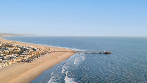 Visit Newport Beach Pier, within walking distance of you doorstep