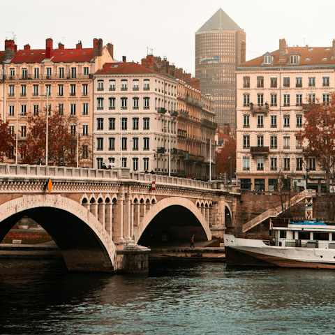 Take an idyllic stroll along the the Rhône with a coffee and a croissant