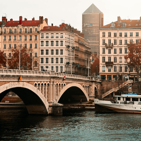 Take an idyllic stroll along the the Rhône with a coffee and a croissant
