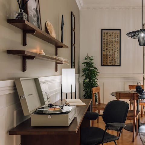 Catch up on work at the desk while the record player serenades you