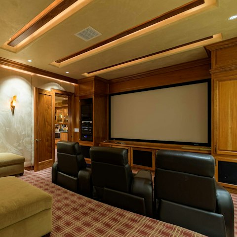 Watch your favourite films in the impressive home cinema