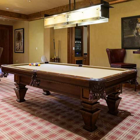 Play a round of pool in the games room