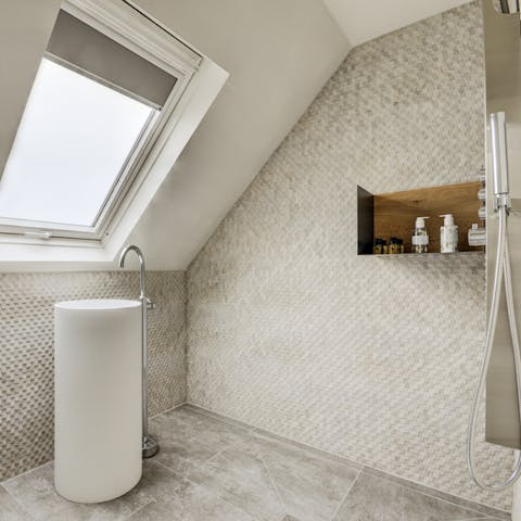 Take a refreshing shower in the state-of-the-art walk-in wet room
