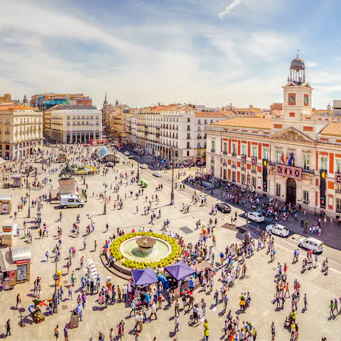 Feel the energy of the bustling squares of the city