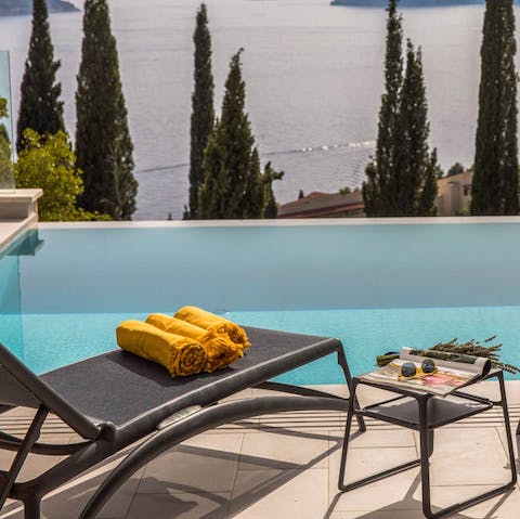 Enjoy sweeping views across the Adriatic whilst lounging by the pool