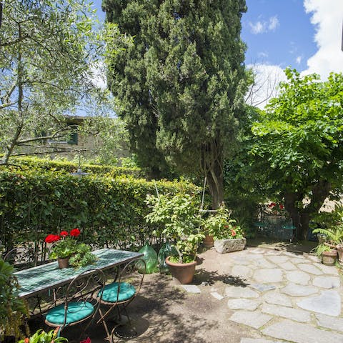 Sip espresso in the sunny garden