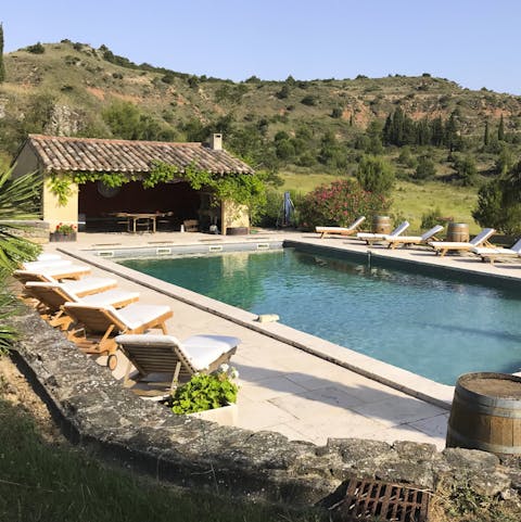 Lounge by the pool with a glass of the region’s famous wine in hand