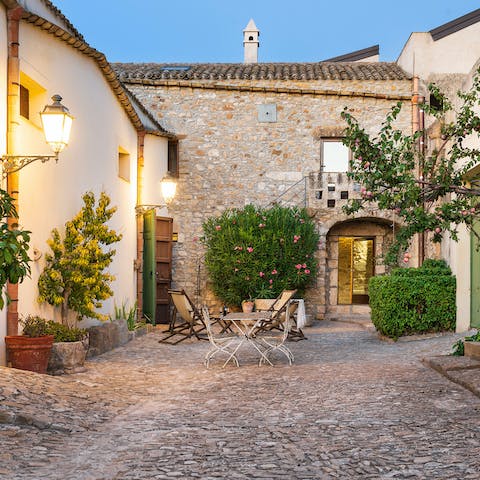 Enjoy drinks and card games in the open courtyard