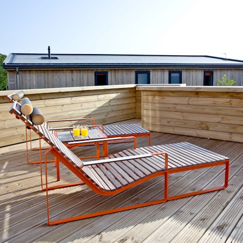 Sunbathe out on your private terrace