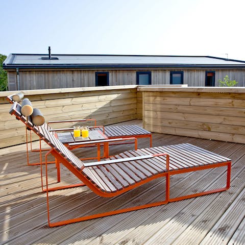 Sunbathe out on your private terrace