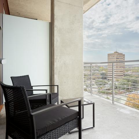 Kick back with a cold beer on your private balcony