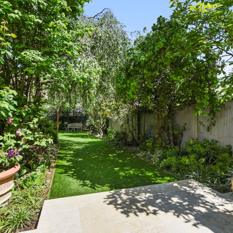 Potter about the home's huge garden and find a spot out in the shade