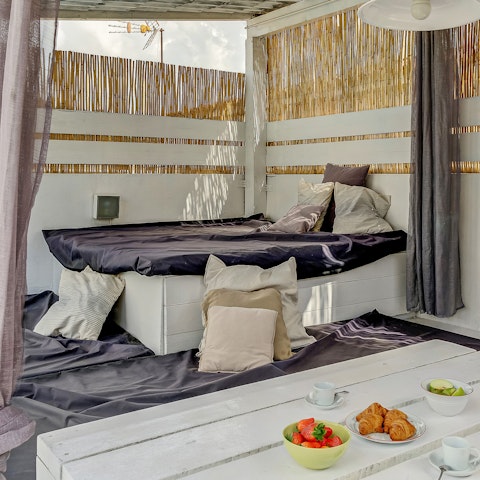 Chill out over breakfast on the covered terrace