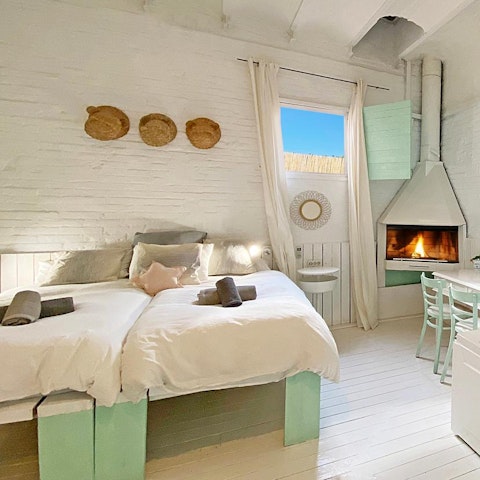 Warm up during winter stays with a fire in the master bedroom