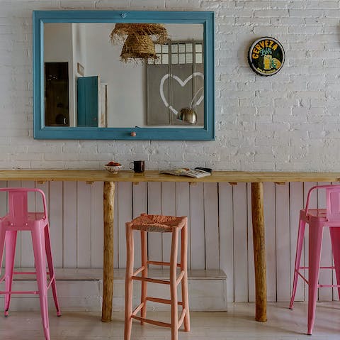 Sip drinks at your own bar area