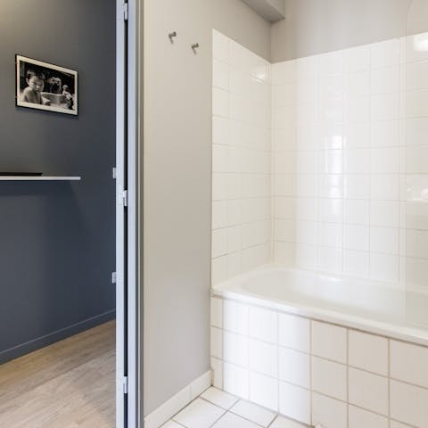 Soak your feet in this white-tiled bathtub after an action-packed day of sightseeing