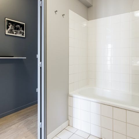 Soak your feet in this white-tiled bathtub after an action-packed day of sightseeing