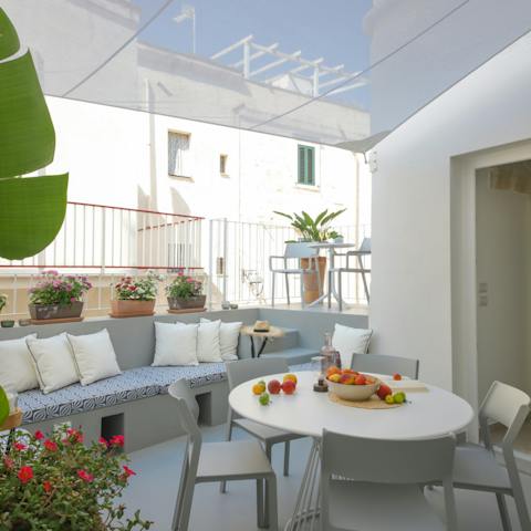 Dine alfresco on home-cooked pasta e fagioli on the terrace