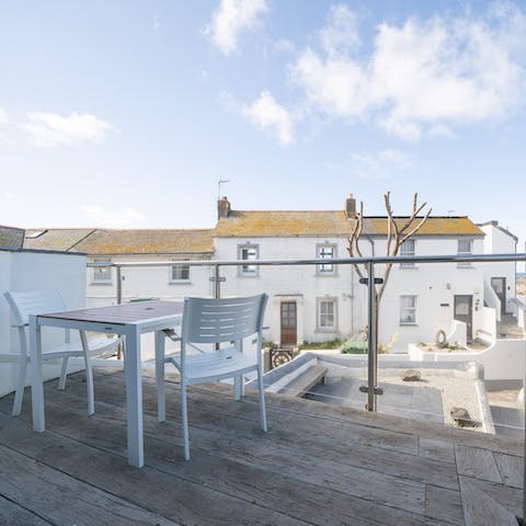 Enjoy the elevated balcony view on a sunny day
