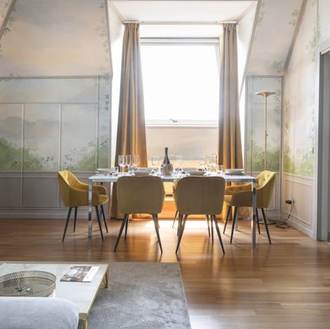 Admire the handpainted murals in the dining area