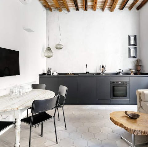 Sip Italian coffee at the chic dining area over breakfast while planning the day's adventures