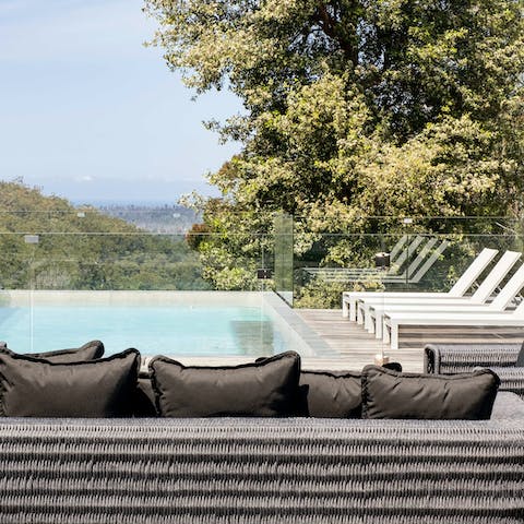 Kick back and relax by the private pool