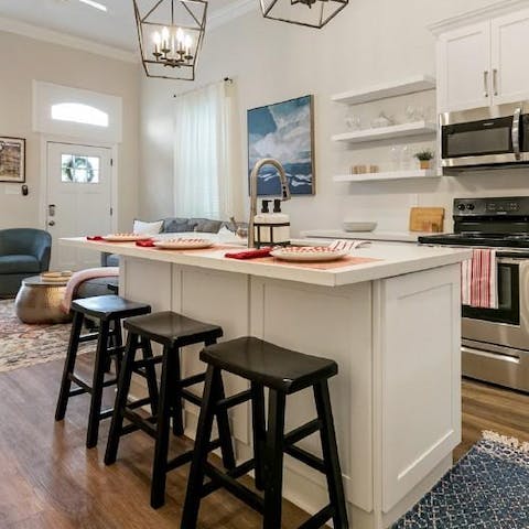 Tuck in to a delicious meal on the bar-style table