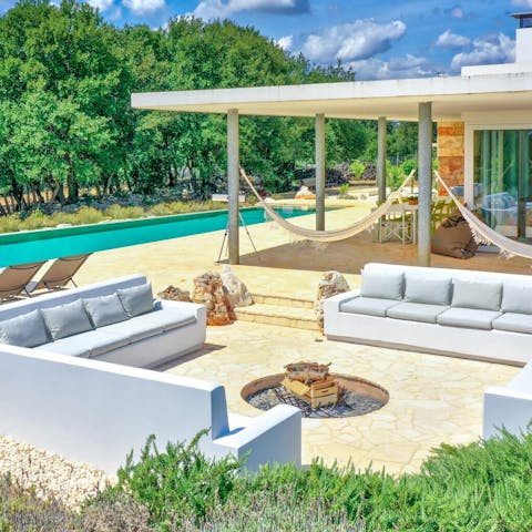 Gather round the firepit in the balmy evenings for cocktails and chats