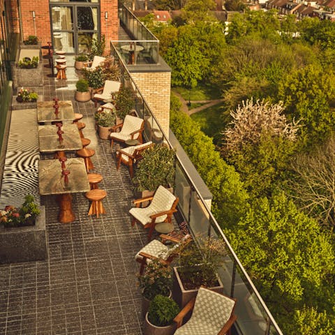 Step out onto the wraparound roof terrace and take in the sweeping views
