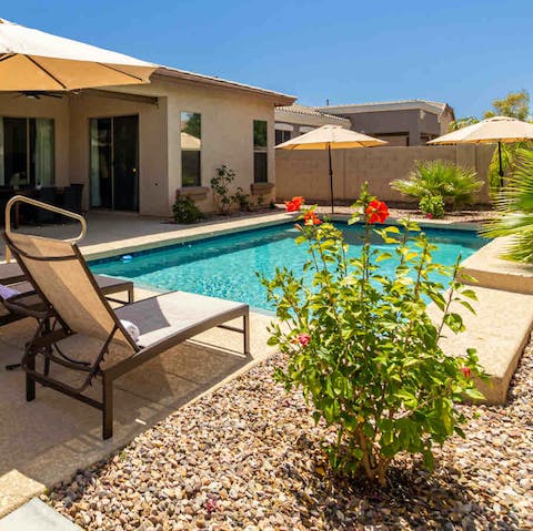 Spend slow afternoons relaxing by the pool