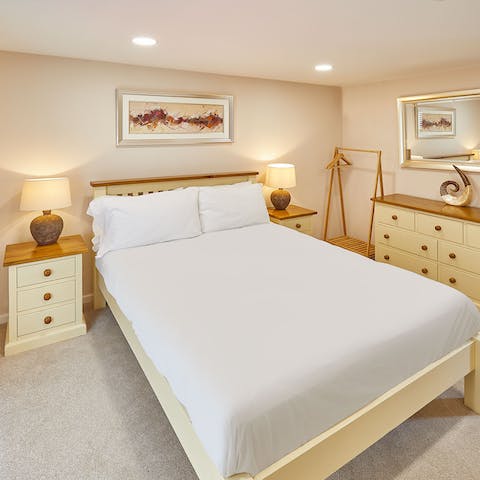 Drift off to sleep in this calming bedroom, after an action-packed day of sightseeing