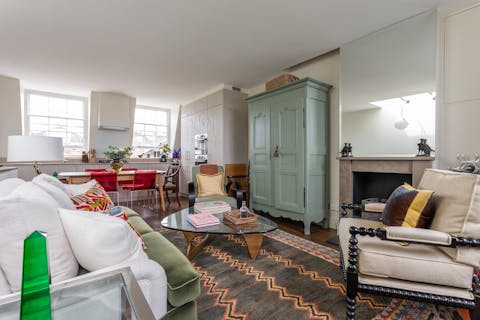 Rest weary feet in the cosy living area after sightseeing around London