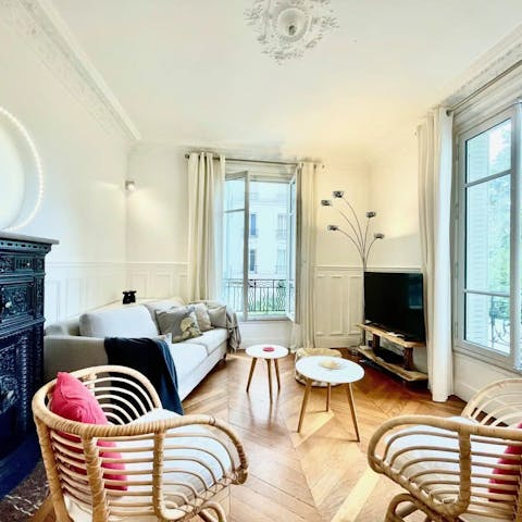 Gather round the sofas in the light-filled living space