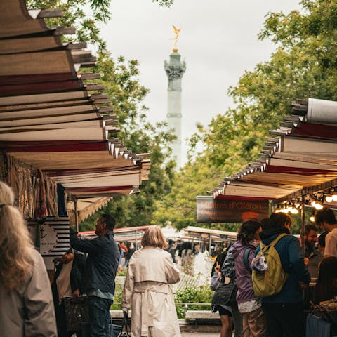 Mingle with locals at the Bastille Market