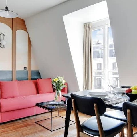 Settle on the sofa with a coffee and open the French doors