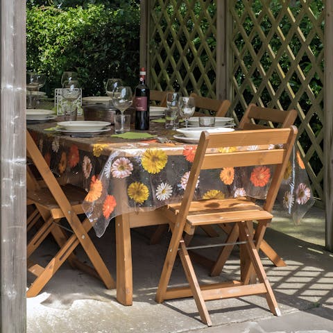 Share delicious Tuscan-inspired feasts and Italian wine in the gazebo