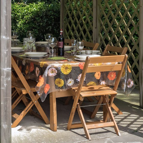 Share delicious Tuscan-inspired feasts and Italian wine in the gazebo