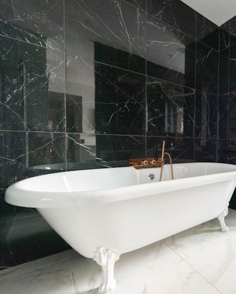 Have a rejuvenating soak in the clawfoot bathtub