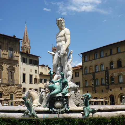 See the Fountain of Neptune, located only a short walk away
