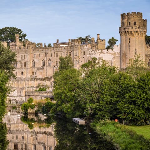 Walk the medieval grounds of Warwick Castle, only a ten-minute drive away