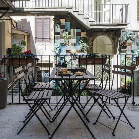 Enjoy morning pastries and coffee on your shaded terrace